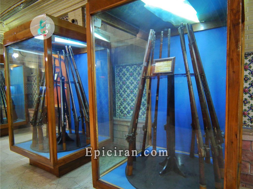Some old black guns in museum showcases in museum of afif abad garden in shiraz
