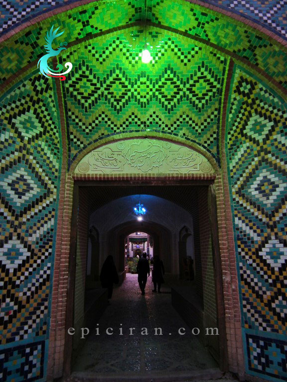 a green light inside of shah nematollah vali shrine