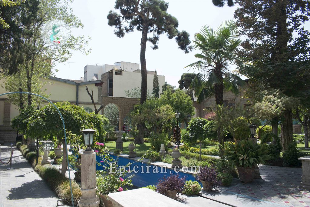 the yard of moghadam museum that is full of trees