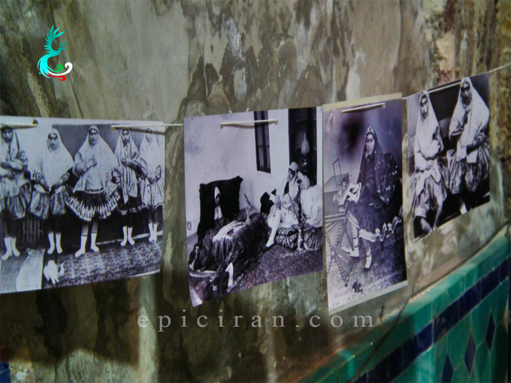 old images on the walls in Qajar Bathhouse
