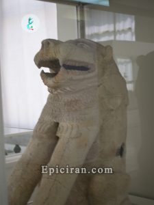 white stone object shaped like lion in national museum of iran