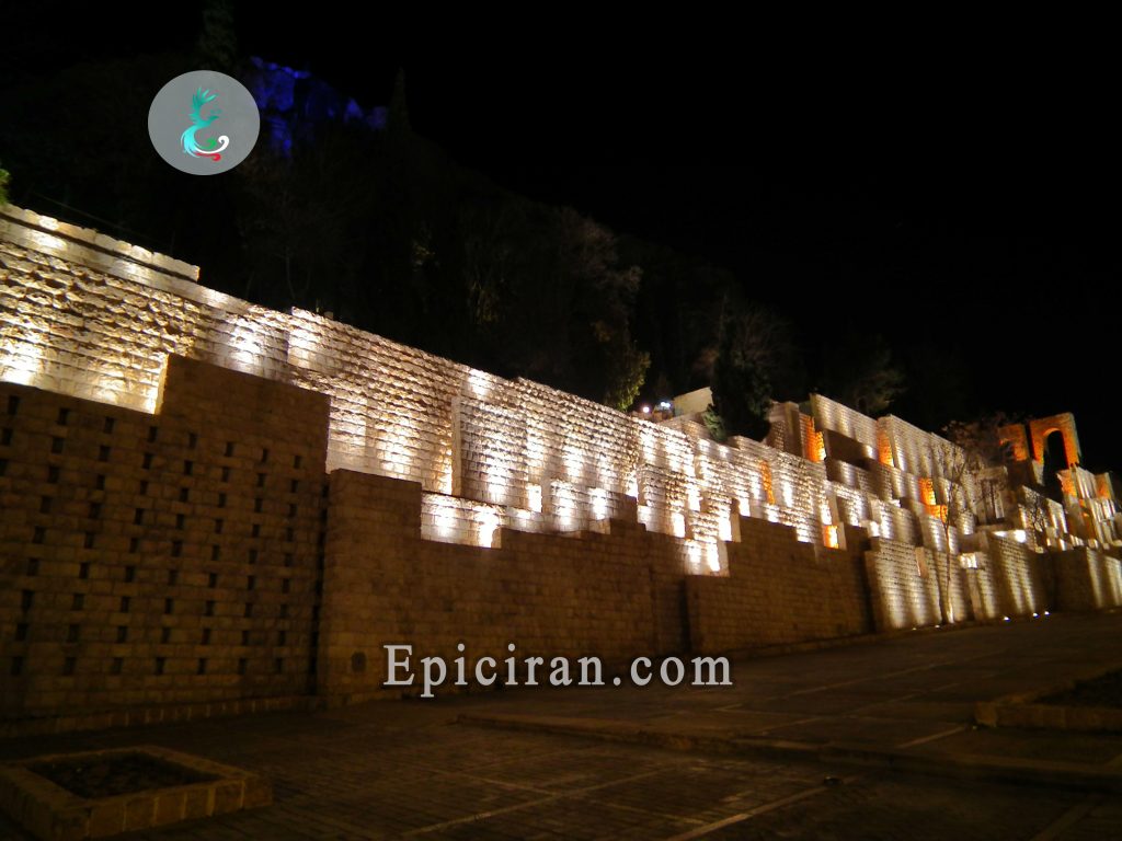 white lights in a wall in khwaju kermani tomb at night in shiraz