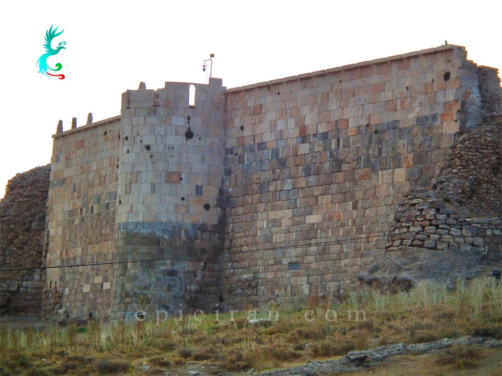 huge ruined wall and tower around takht-e soleymab=n in iran