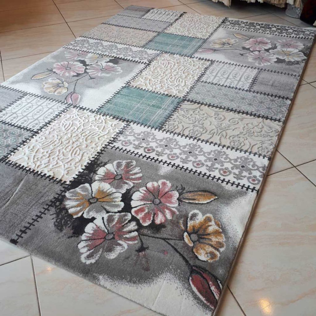design of european flowers on grey persian rug