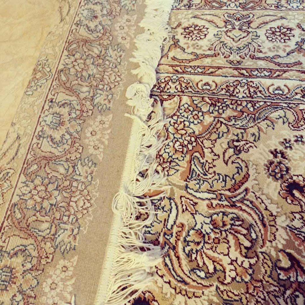 fringe of persian rug ready to cleaning