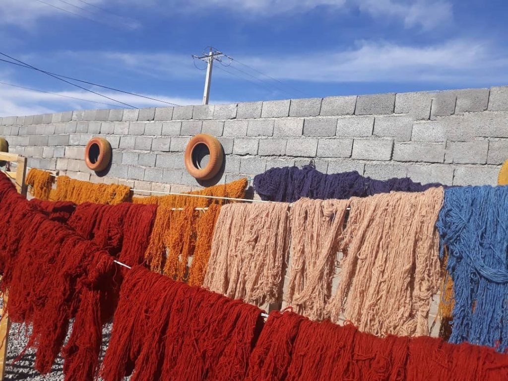 red, yellow, pink and blue threads used as threads colors in persian carpets
