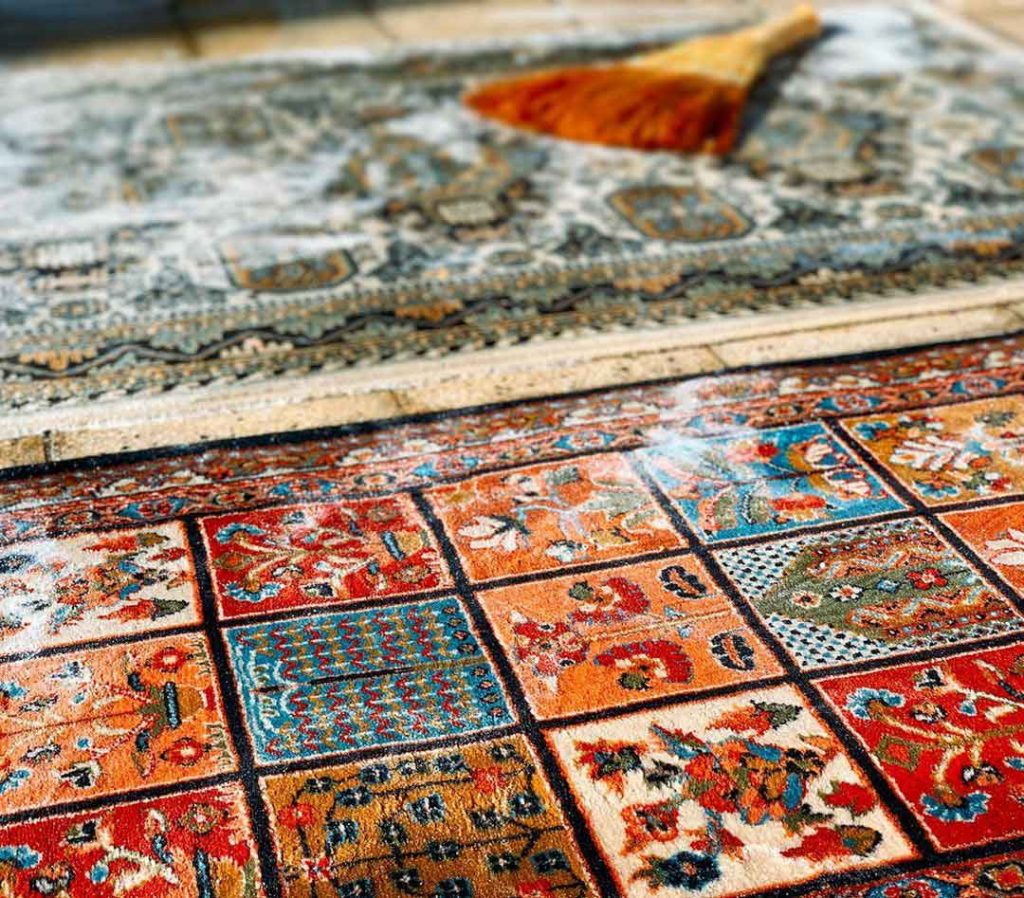 colorful persian rug cleaning by old brush