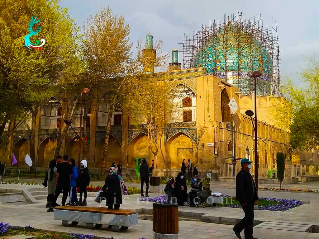 people around chahr bagh school in isfahan in autumn