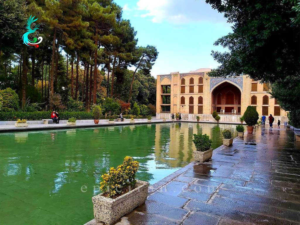 a fountain in front of chehel sotoun palace in isfahan