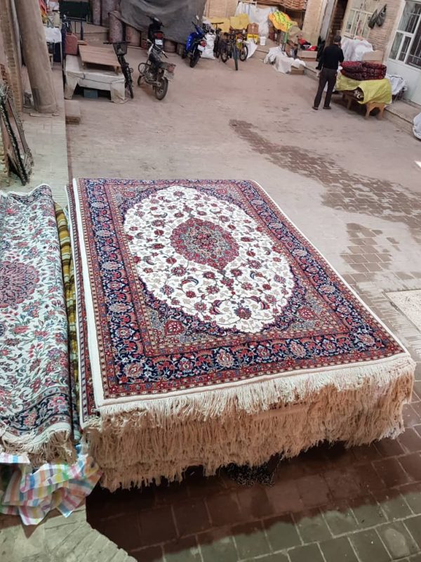 white and dark blue persian area rug
